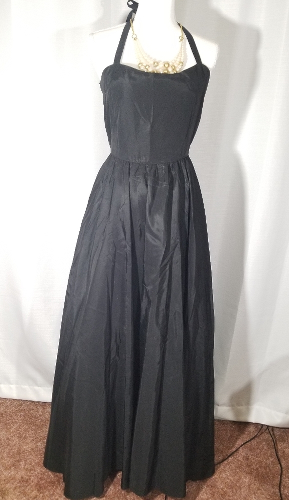 ABS Evening Collection halter black evening gown.